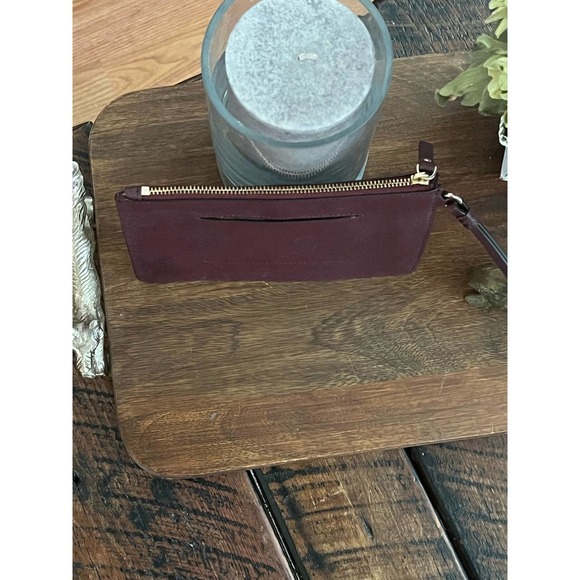 Kate Spade plum/maroon colored wristlet/clutch - Picture 6 of 11